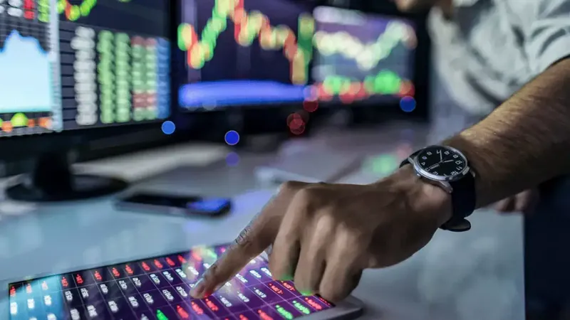 Financial analysts reviewing company earnings reports