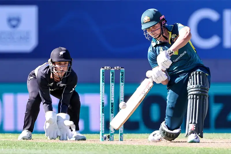 Australian women's cricket team in action during a match.