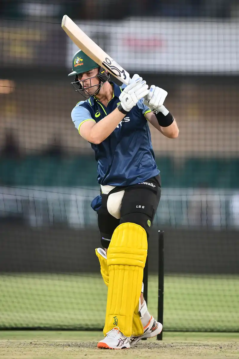 Cricket match between Australia and Bangladesh with players on the field