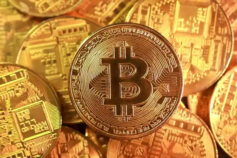 Bitcoin symbol with declining graph