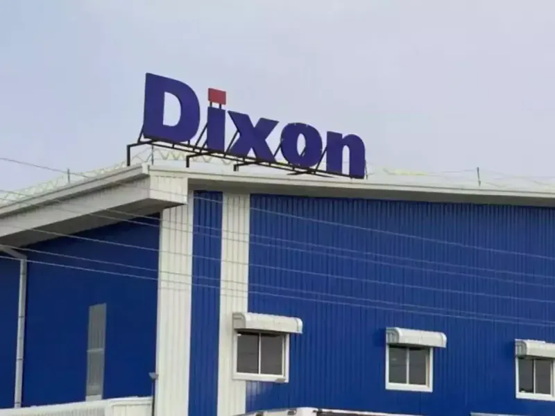Dixon Technologies manufacturing facility with workers assembling smartphones