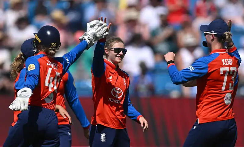 England and India cricket teams in action during a T20 match