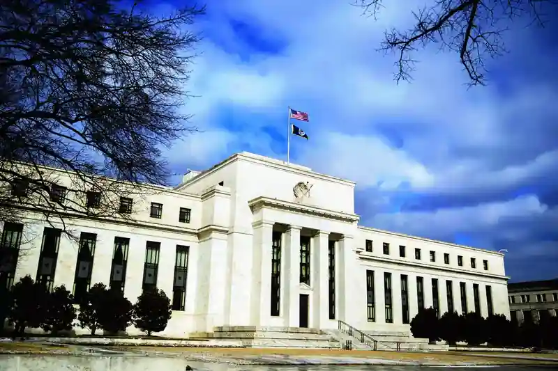 Federal Reserve building with economic data overlay