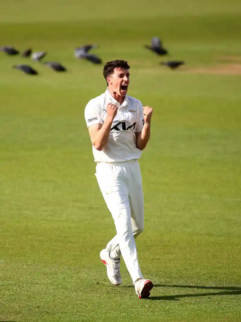 Matthew Fisher bowling at The Oval amidst rain delays