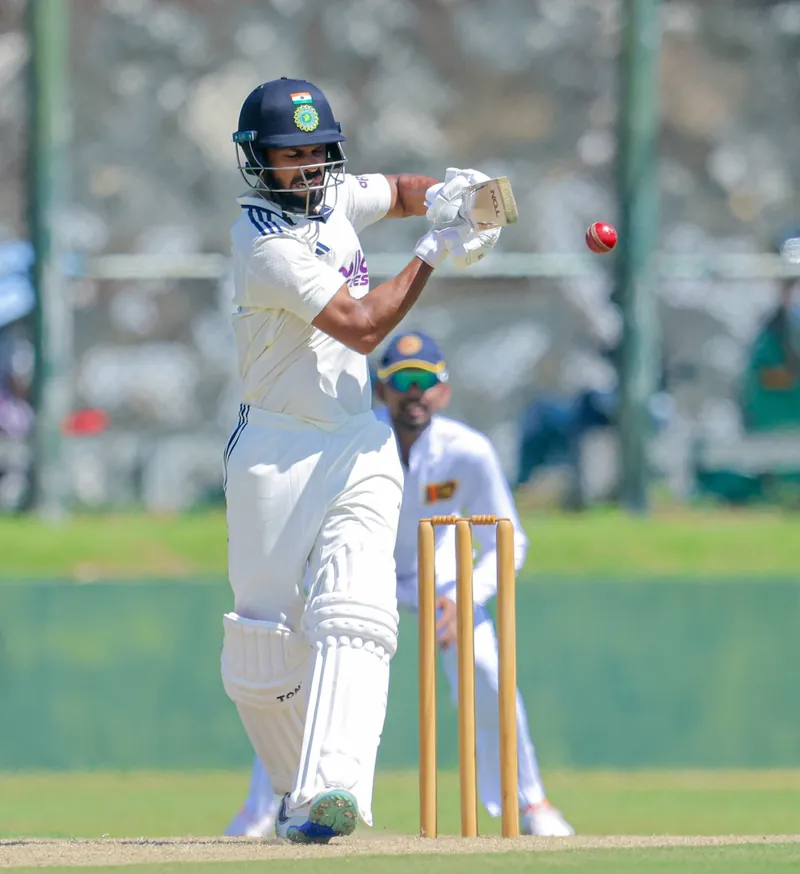 Ruturaj Gaikwad in cricket gear on the field