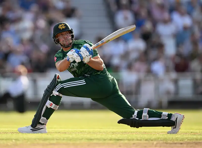 George Munsey batting during a cricket match