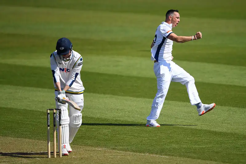 Kyle Abbott celebrates taking a wicket during the match against Yorkshire