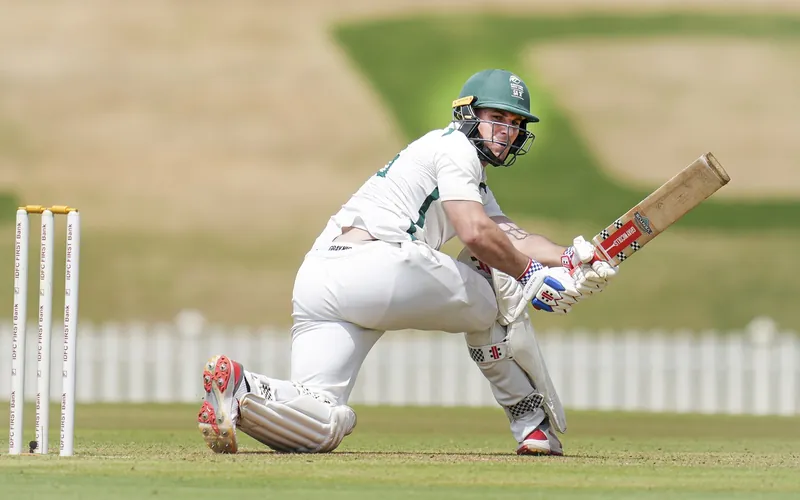 Hermann celebrating his century during the match at Canterbury