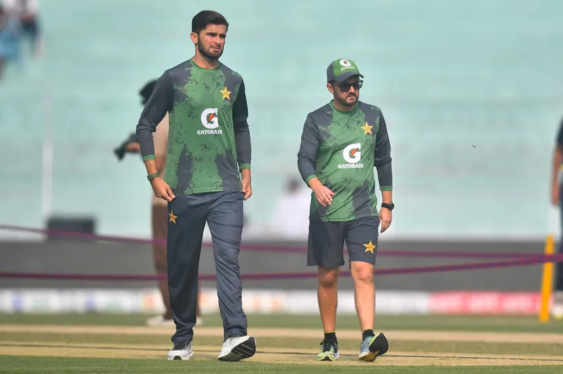 Cricket pitch in Pakistan with players practicing