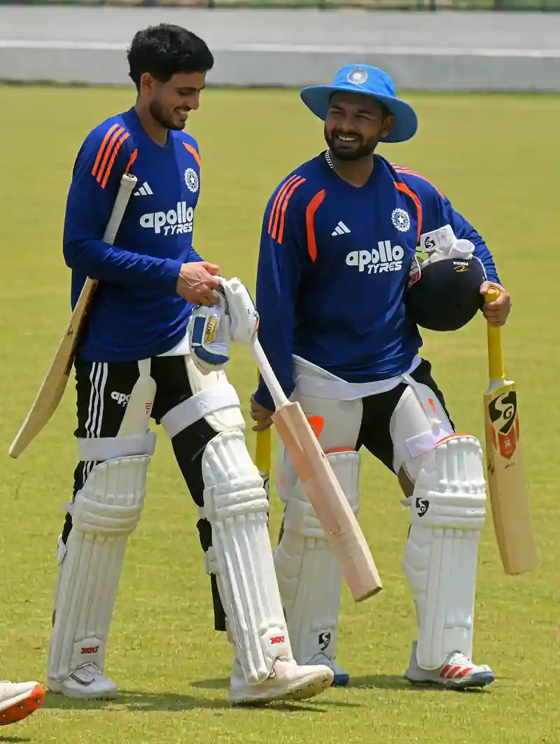 Indian cricket team players in a huddle during a match