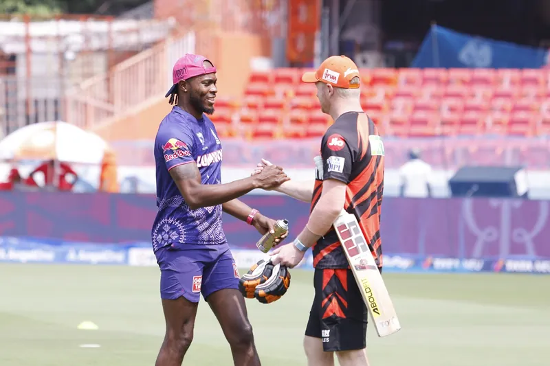 Cricket players Jaisoorya and Travishek during an IPL match