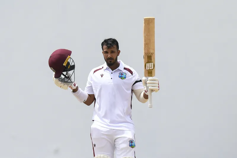 Amir Jangoo and Roston Chase celebrating their record partnership