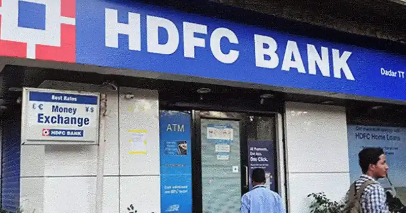 HDFC Bank building with stock market charts overlay