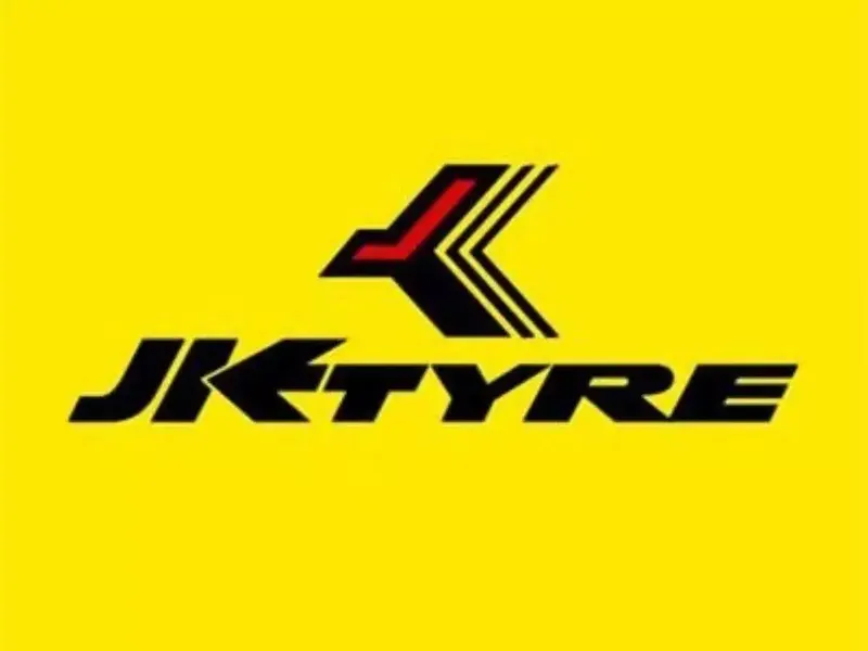JK Tyre manufacturing plant with workers and machinery