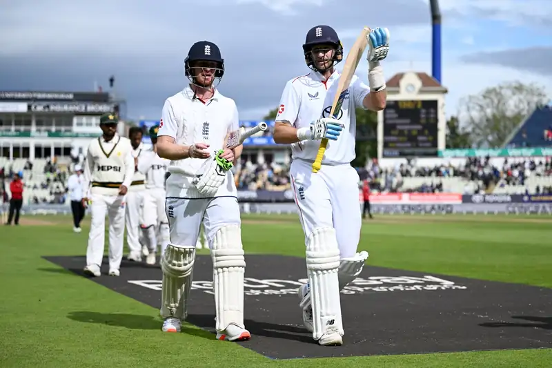 Joe Root celebrating a cricket victory with his team