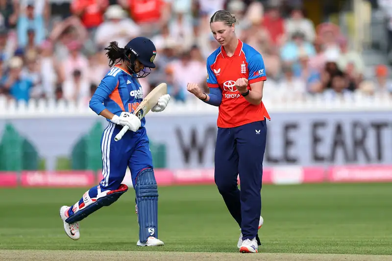 Sarah Kemp celebrating during a cricket match
