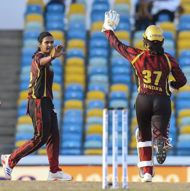 Trinbago Knight Riders team celebrating a victory in an IPL match