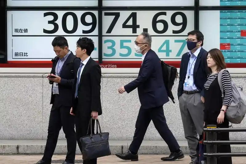 Korean stock market board displaying Kospi index figures