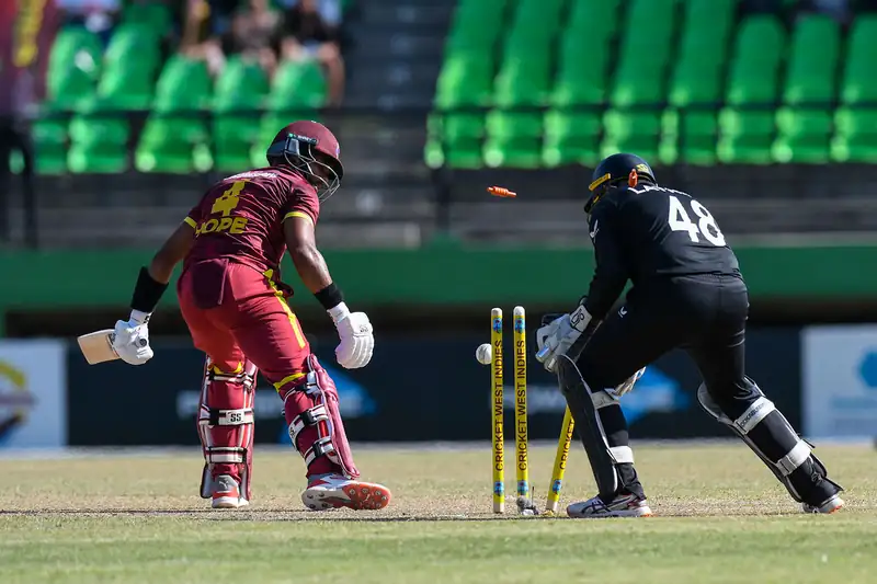 Lennox bowling during a cricket match