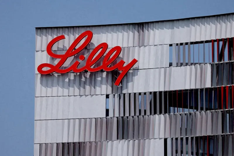 Eli Lilly logo with medical research imagery