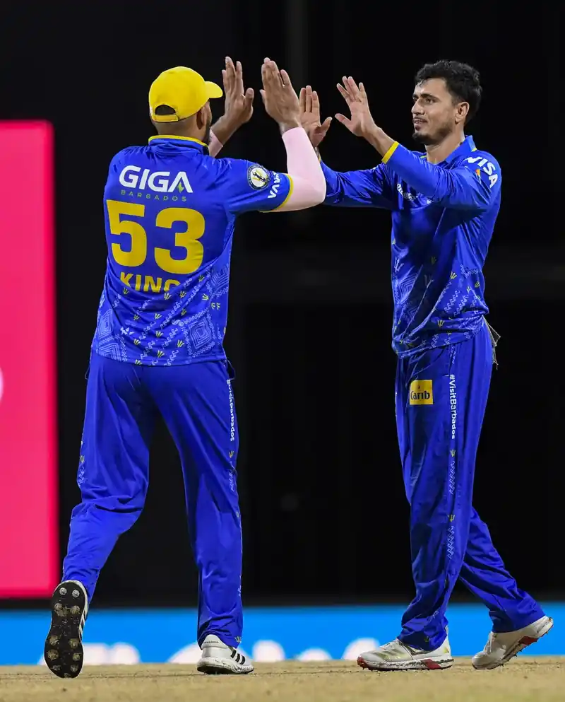 Mujeeb Ur Rahman bowling during an IPL match