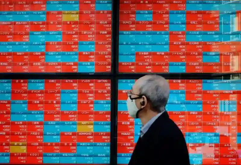 Tokyo Stock Exchange with fluctuating stock prices