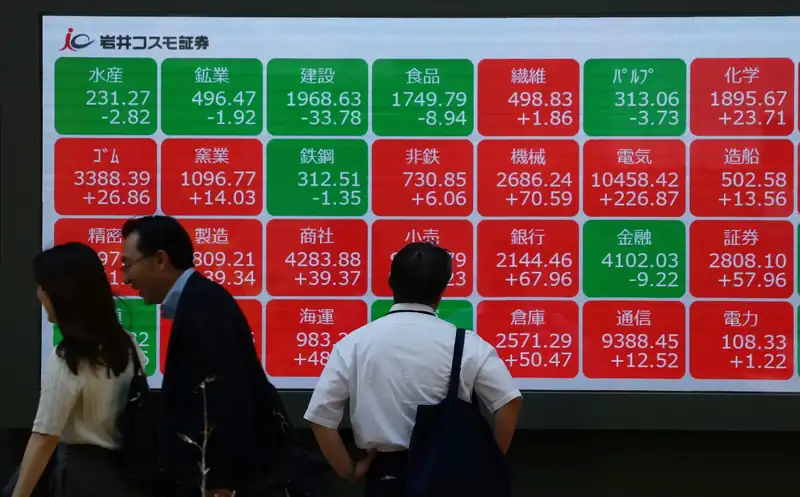 Tokyo Stock Exchange with rising stock charts