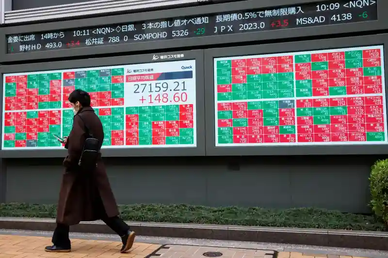Tokyo Stock Exchange with rising stock charts