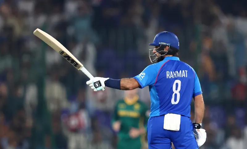 Rahmat Shah celebrating his century during an ODI match