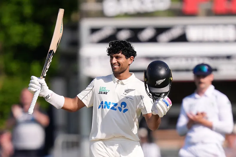 Rachin Ravindra and Tom Blundell celebrating their centuries