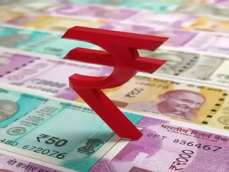 Indian Rupee notes and a financial graph depicting forex market trends