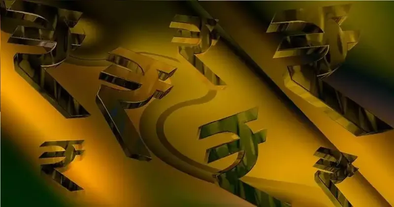 Close-up of Indian rupee and US dollar notes