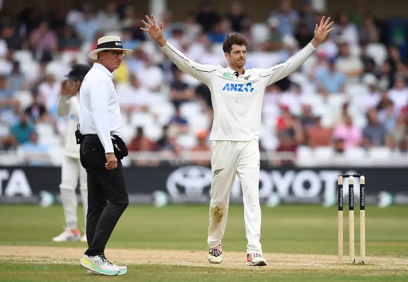 Mitchell Santner playing cricket for New Zealand