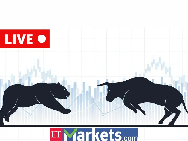Stock market display board showing declining numbers