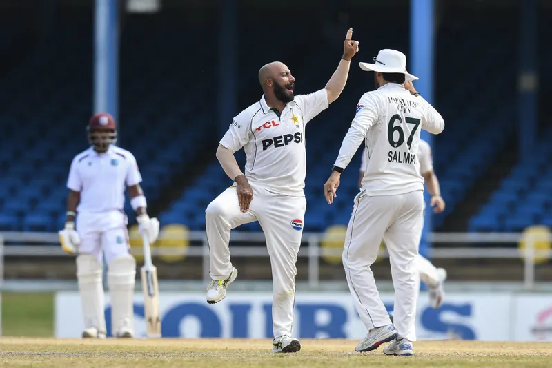 Cricket players in action during a Test match