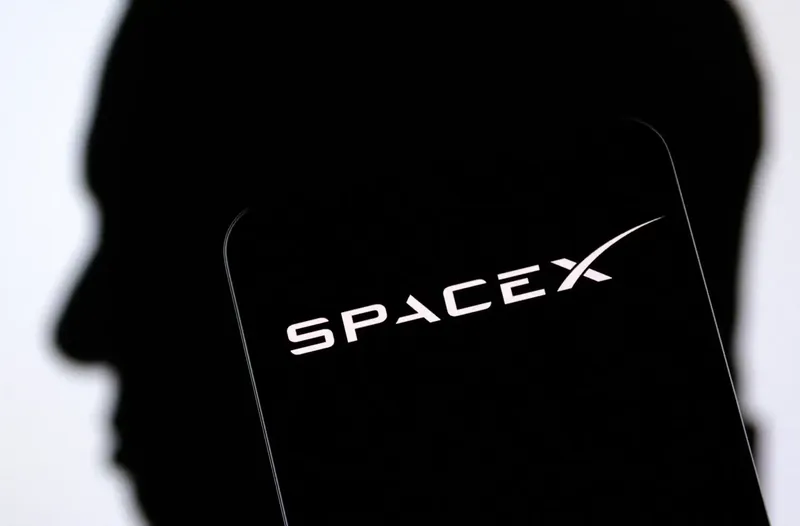 SpaceX rocket launch with clear sky background