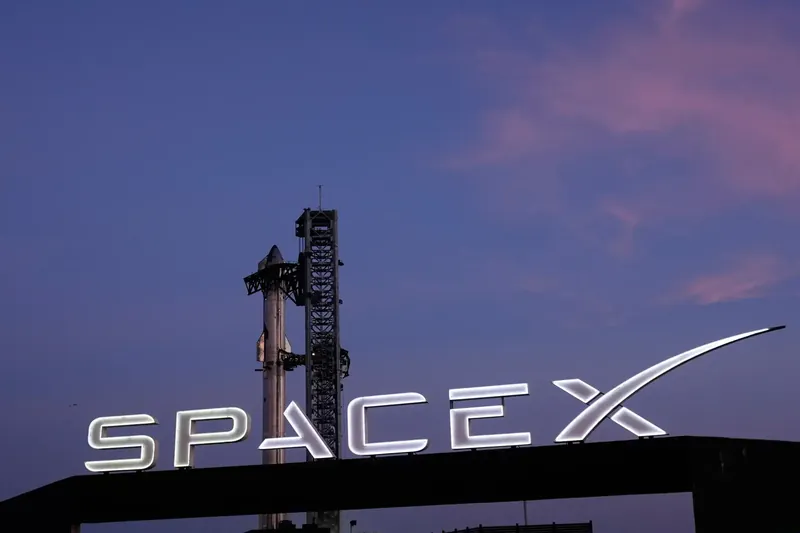 SpaceX logo on a stock market background