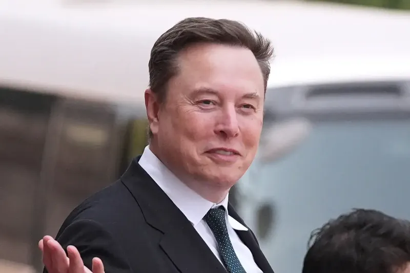 Elon Musk speaking at a SpaceX event