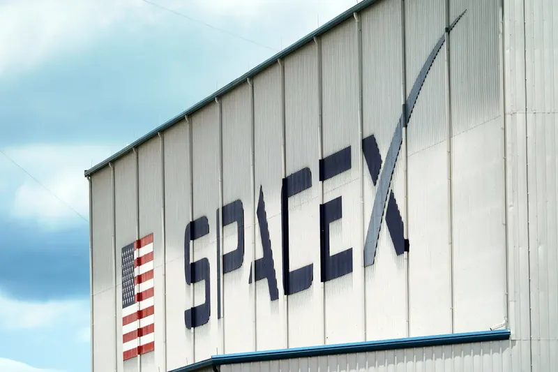 SpaceX rocket launch with investors observing