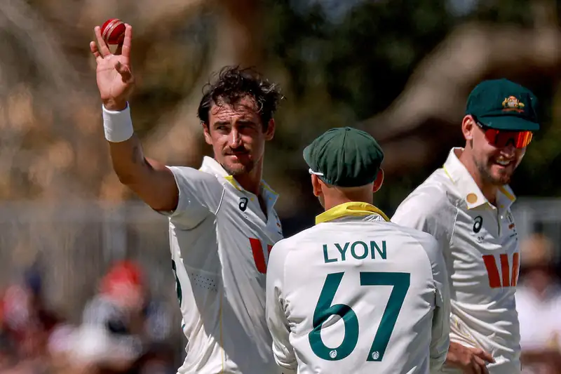Mitchell Starc celebrates after taking a wicket against Bangladesh