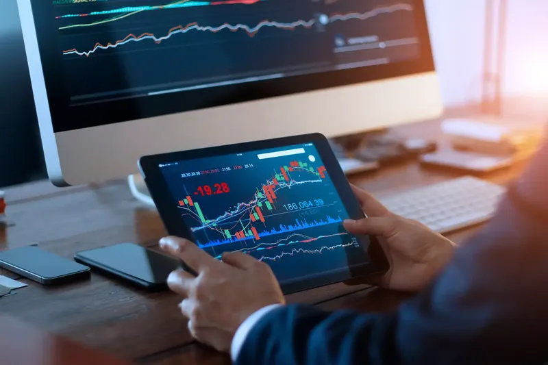 Stock market ticker displaying various company stocks