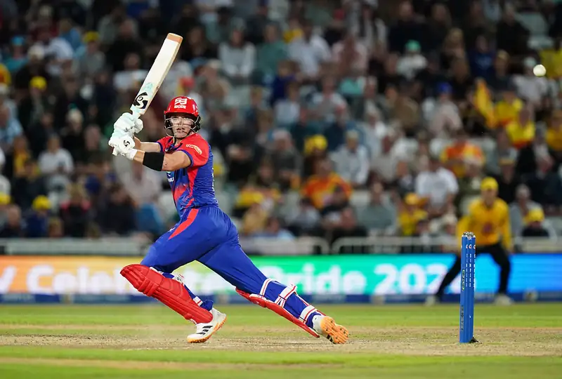 Cricket players in action during an IPL match