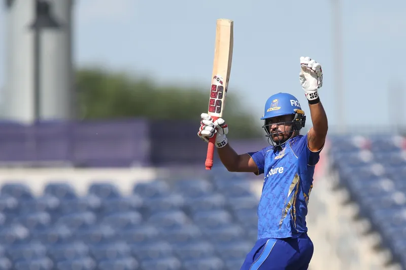 Cricket players in action during a match
