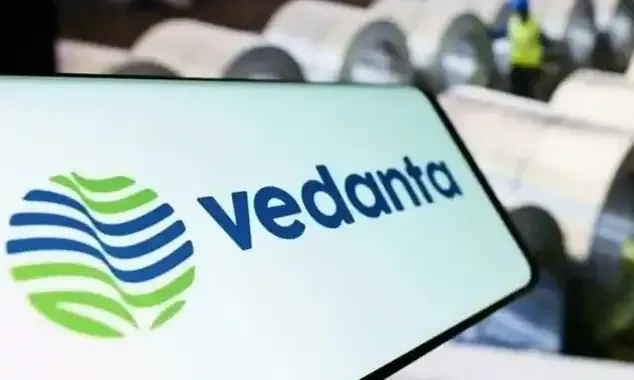 Vedanta Group logo with stock market background