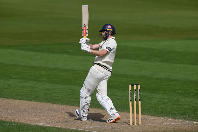 Chris Woakes celebrating victory with Warwickshire teammates