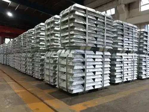 Zinc metal bars stacked in a warehouse